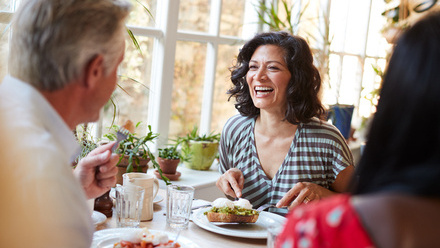 woman_smiling_eating.jpg