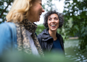 Women laughing, friends, outside, walking