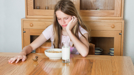 ARFID Girl looking at cereal eating disorders