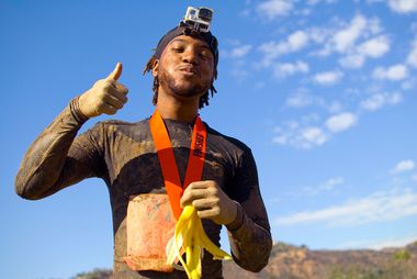 sports nutrition runner eating banana