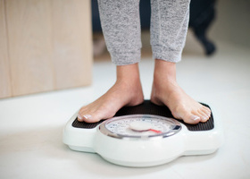 person_standing_on_scales.jpg