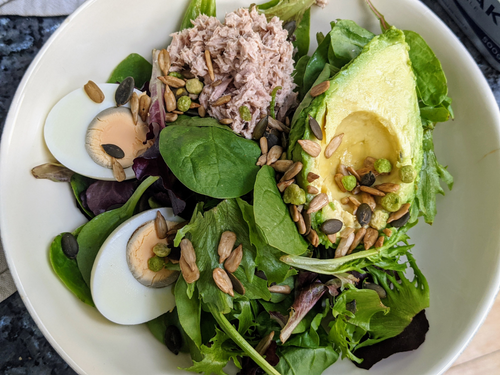 Avocado and egg salad with tuna mayo and seeds