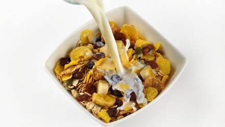 breakfast cereal with pouring milk.png