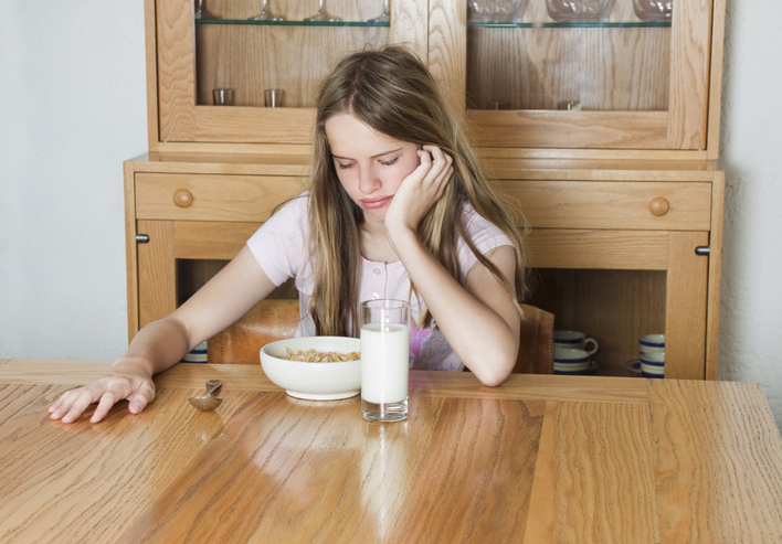 ARFID Girl looking at cereal eating disorders
