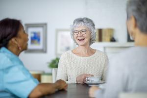 Senior woman talking with friends - Malnutrition food fact sheet image